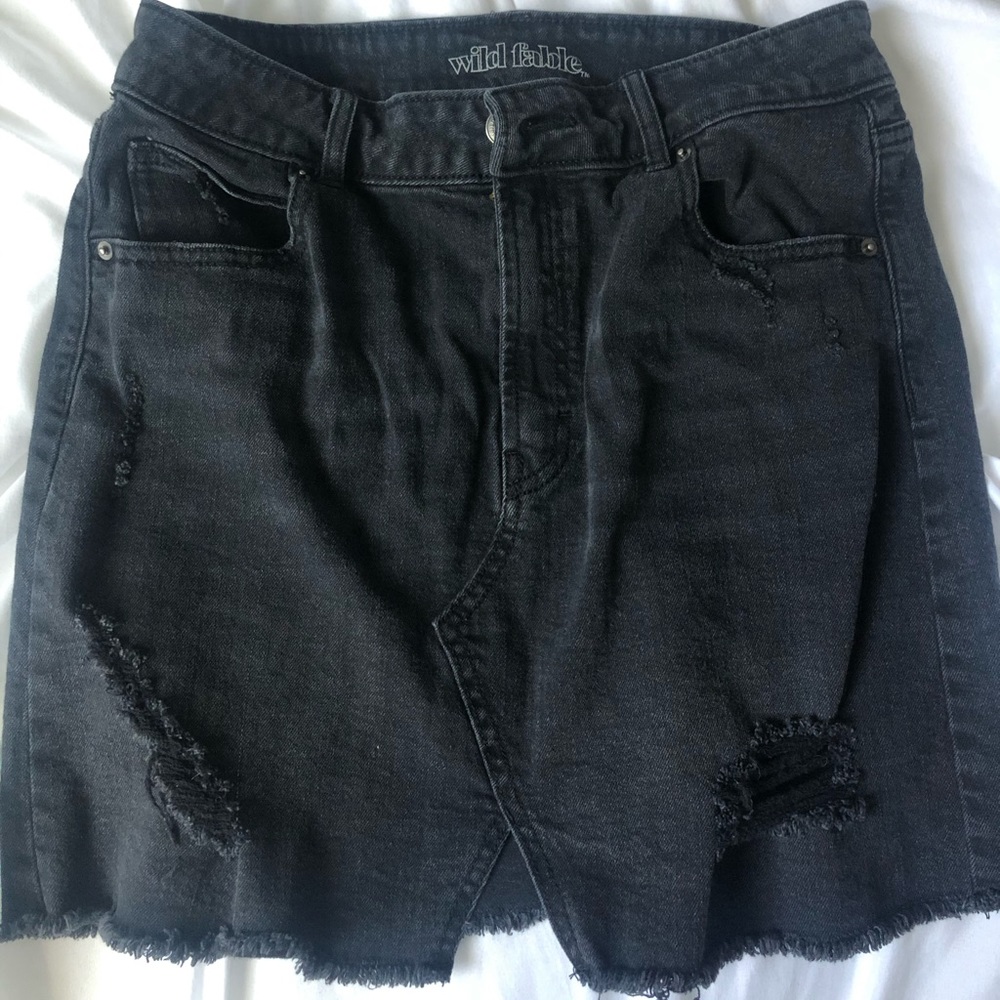 Distressed black denim skirt